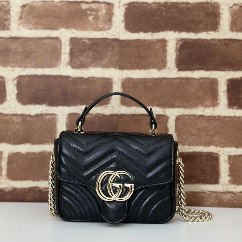 G*u*i top handle bags